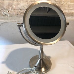 Double sided free standing mirror